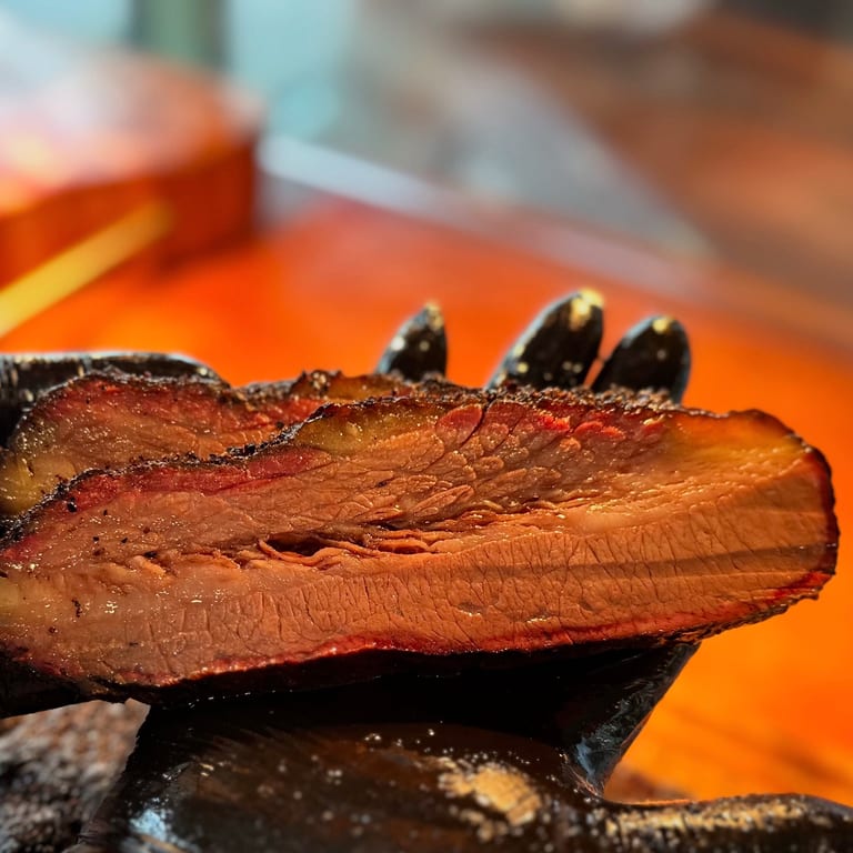 Indulge in Our Smoked Brisket